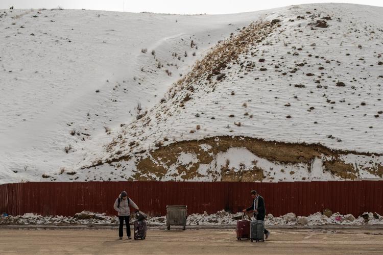 Iranians grapple with whether to flee the country because of the war