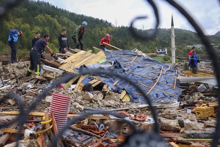 Rescue teams search for missing after floods, landslides kill at least 16 in Bosnia