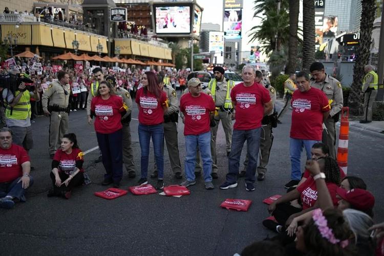 Union workers arrested on Las Vegas Strip for blocking traffic as thousands rally