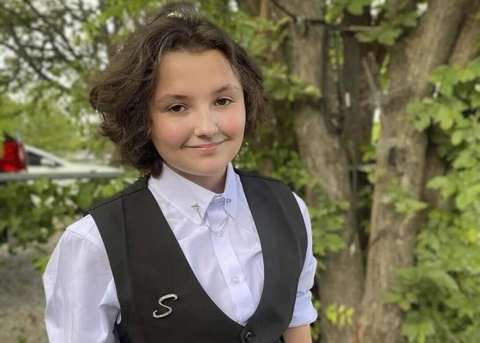 A nonbinary student's death after a high school fight has been ruled a suicide. Here's what to know