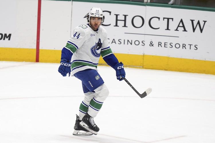 Sherwood's OT goal caps Canucks 3-goal comeback in final minute in 6-5 win over Stars