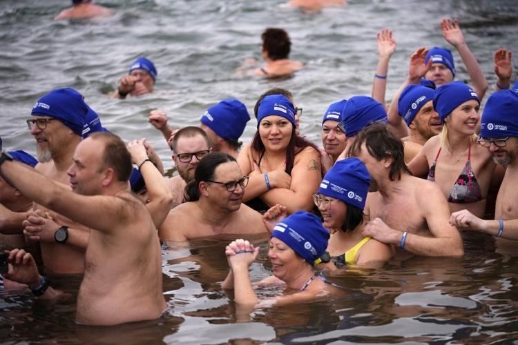 Cold-water swimmers in the Czech Republic set a new world record for the largest polar bear dip