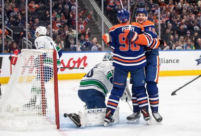 Zach Hyman and Leon Draisaitl lead Oilers to 6-2 victory over Canucks