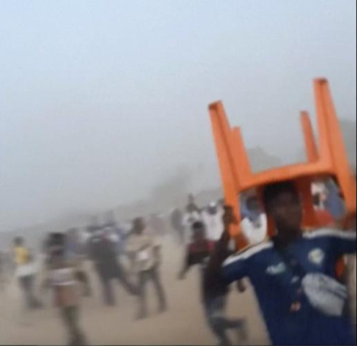 Relatives hunt for the missing after Guinea stadium crush amid fears official death toll is too low