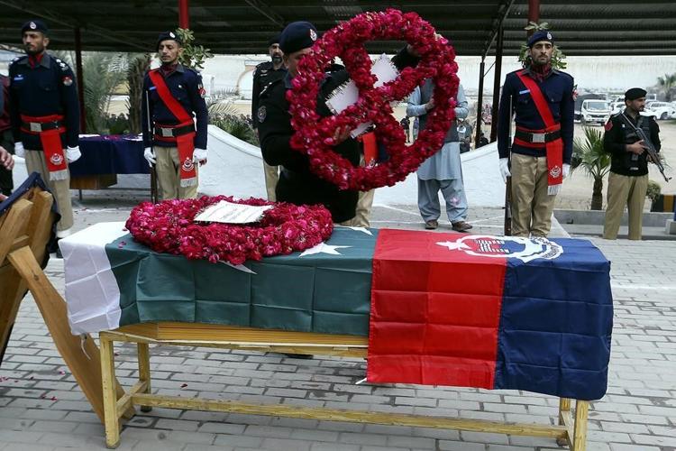 Militant who killed 101 at Pakistan mosque wore uniform
