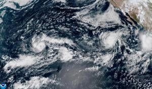 Hurricanes in the Pacific threaten Hawaii and Mexico with floods and high surf