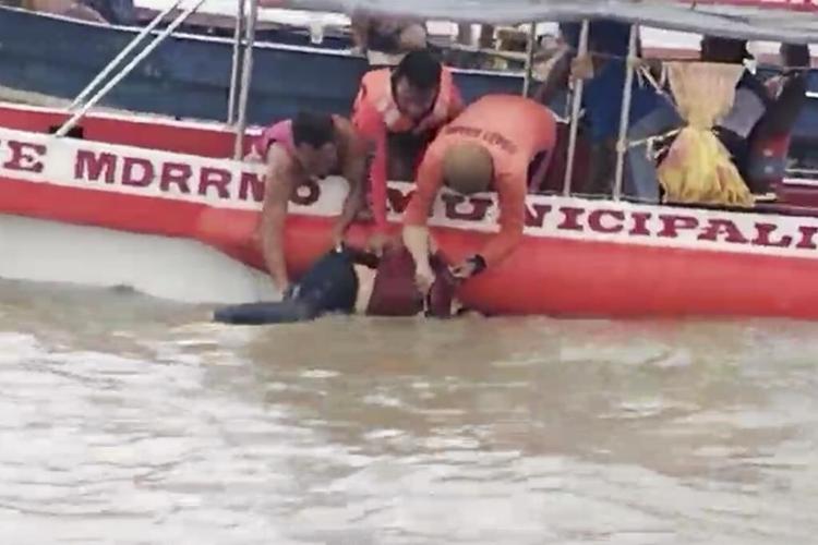 Fierce winds cause panic on ferry that capsizes in Philippines, killing at least 26, officials say