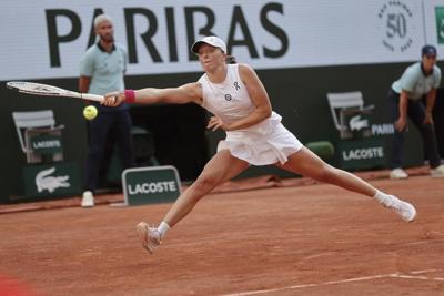 No. 1 Iga Swiatek seeks a 3rd French Open title in women's final against Karolina Muchova