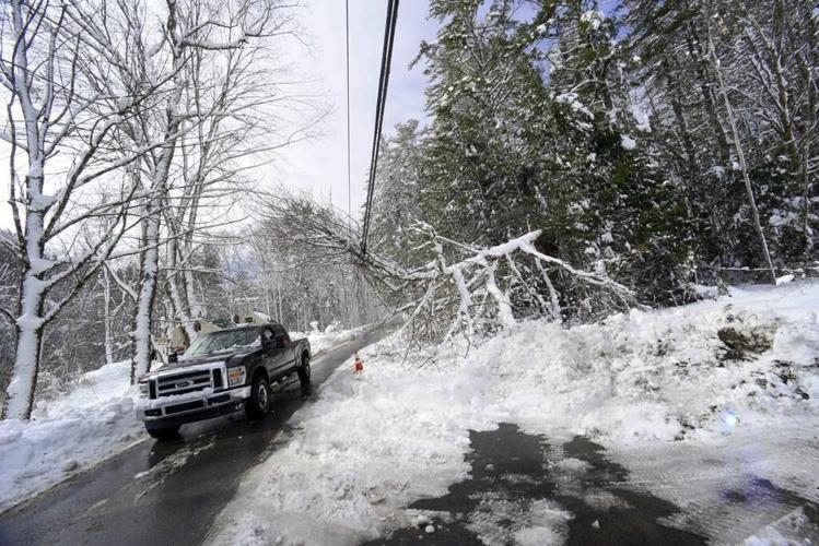 Northeast digs out from winter storm, faces power outages