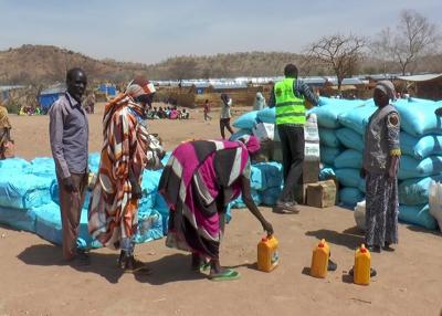 Sudan keeps key aid crossing from Chad open for hard-hit Darfur region as famine grows