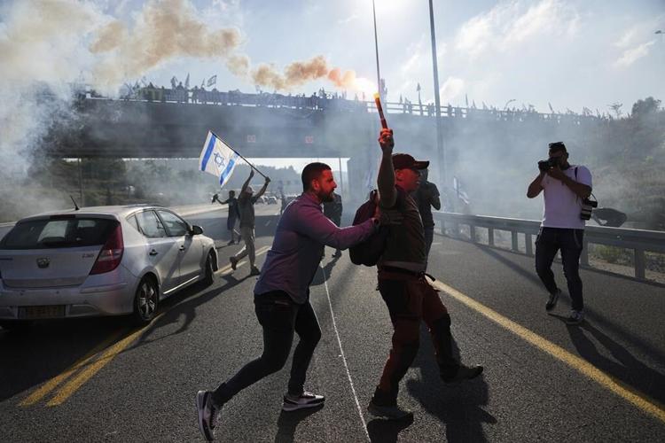 Israelis block highways in nationwide protests over government's plan to overhaul judiciary