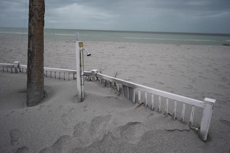 Florida digs out of mountains of sand swept in by backtoback