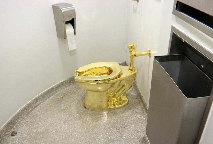 A solid gold toilet is up for auction with a $10 million starting price