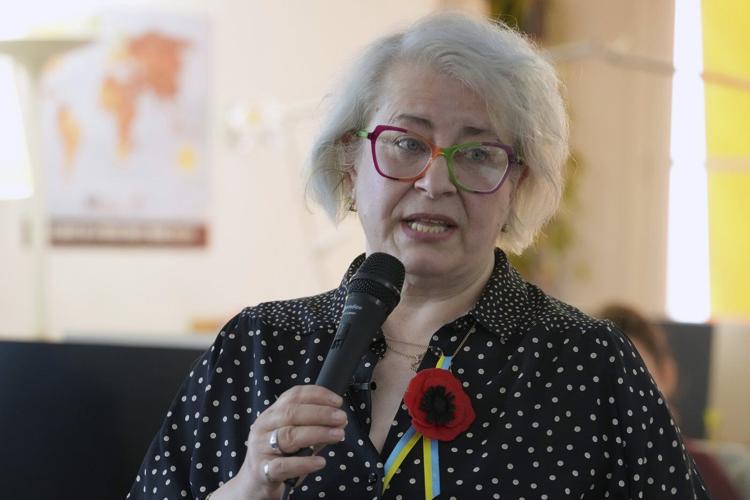 Russian journalist who escaped house arrest in Moscow reappears in Paris after a brutal journey