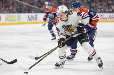 MacKinnon, Matthews, Hellebuyck named three stars for December, Bedard top rookie