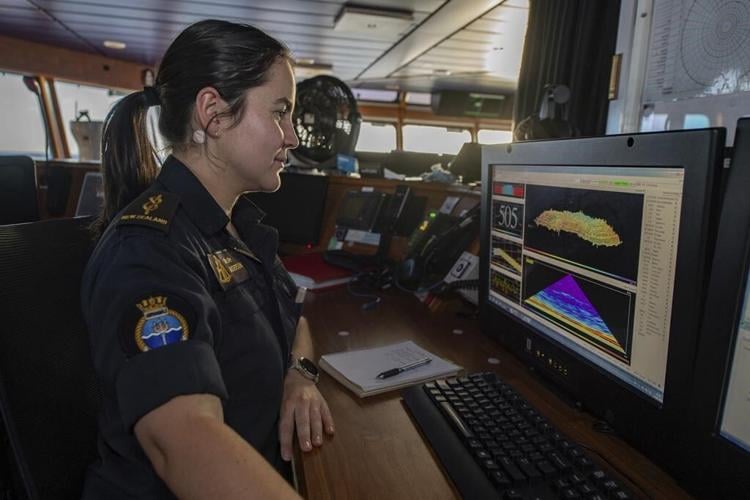 An 'appalled' New Zealand official says a navy ship didn't sink because its captain was a woman