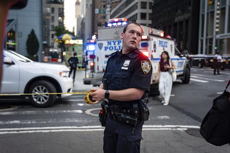 A shooting at a midtown Manhattan office building, in photos