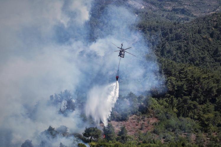 Photos of Syrian firefighters struggling with weeklong fires