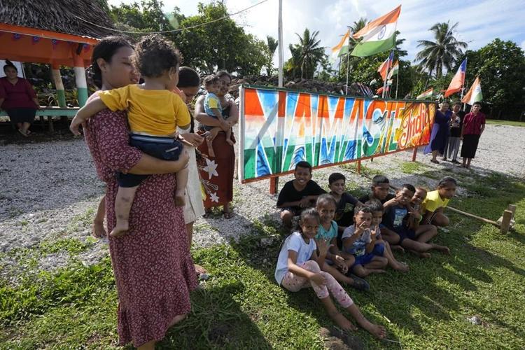 A Samoan village prepares to welcome King Charles but fears an uncertain future for its reef