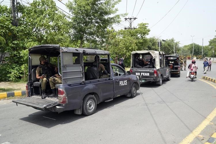 Pakistani police besiege Imran Khan's home as deadline for him to hand over suspects expires