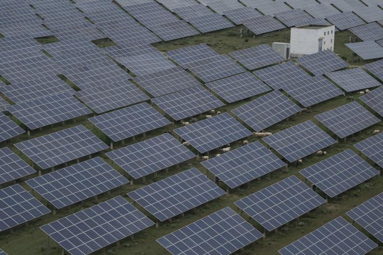 UN says booming solar, wind and other green energy hits global tipping point for even lower costs