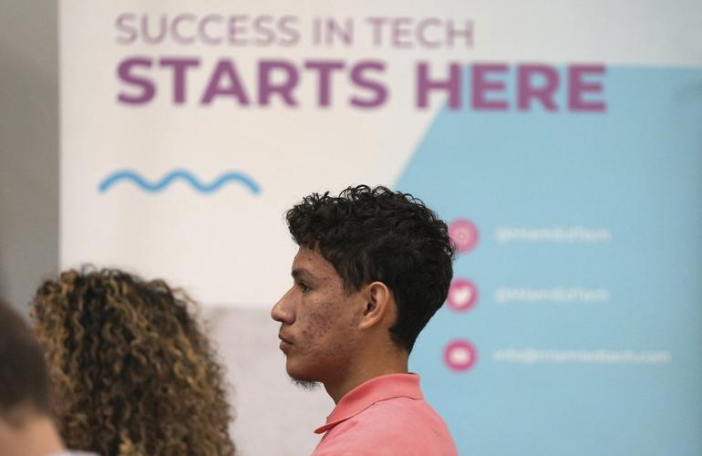 Latino workers working to overcome a technological divide brought on by automation, AI