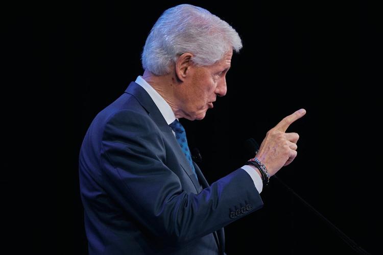 Bill Clinton sees this year's Clinton Global Initiative as a 'counterweight' to aid cuts