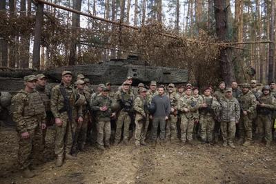 Russia launches more drone attacks as Ukrainian President Zelenskyy travels to a European forum