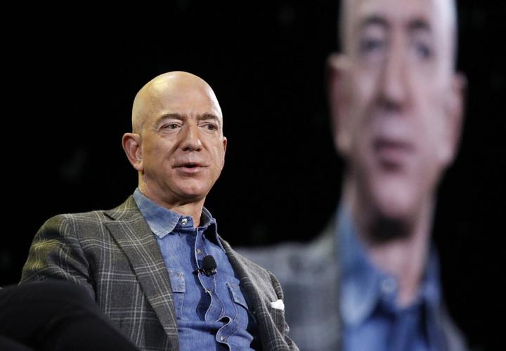 Washington Post owner Jeff Bezos says opinion pages will defend free market and 'personal liberties'