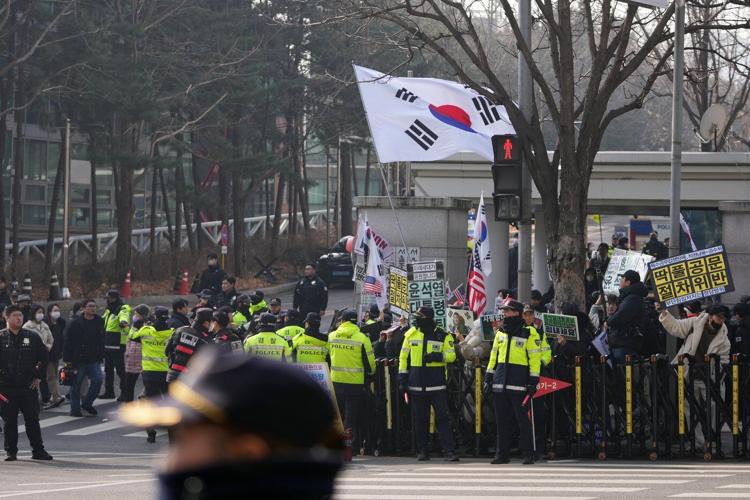 A South Korean court sentences Yoon to 5 years in prison on charges related to martial law decree