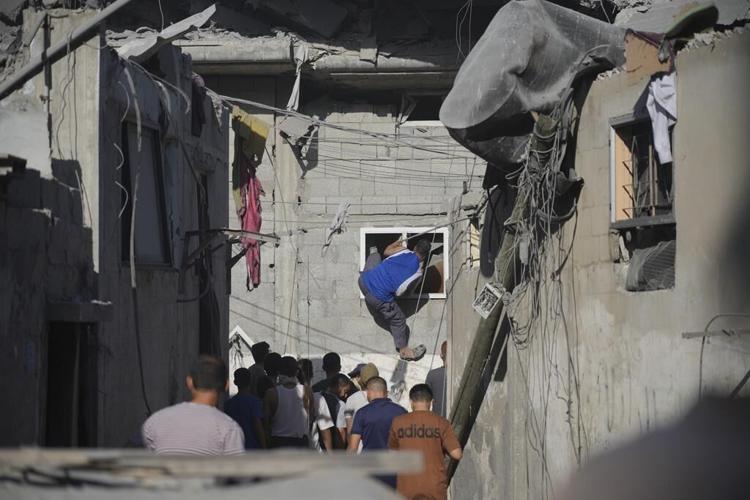 Warplanes strike Gaza refugee camp as Israel rejects US push for a pause in fighting