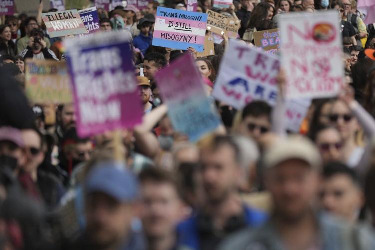 Thousands gather in London to support trans rights following UK ruling over definition of woman