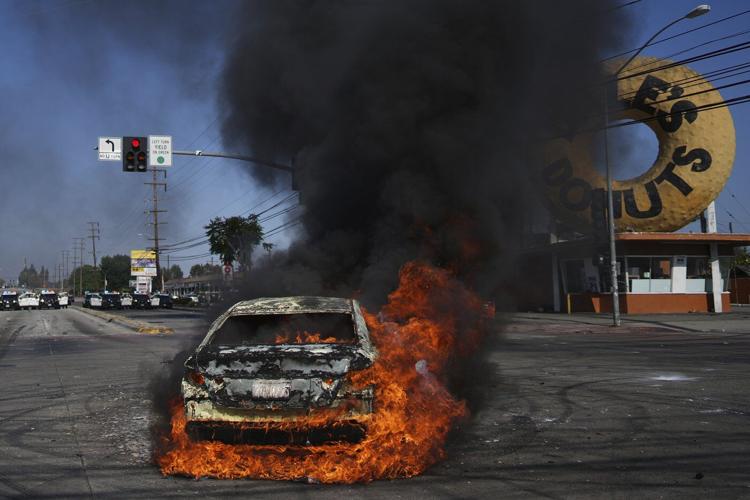 AP PHOTOS: Protesters clash with law enforcement in Los Angeles