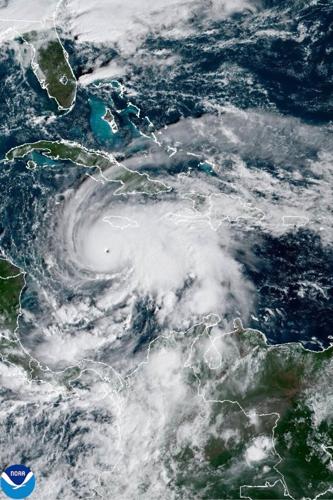 Melissa intensifies to Category 5 on path to slam into Jamaica as island's strongest recorded storm