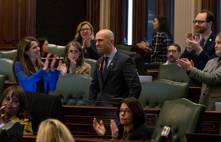 Illinois bans semiautomatic weapons, critics vow court test