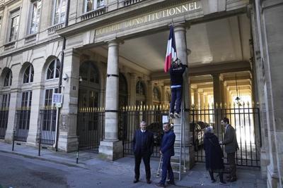Protesters march against Macron's plan to raise pension age