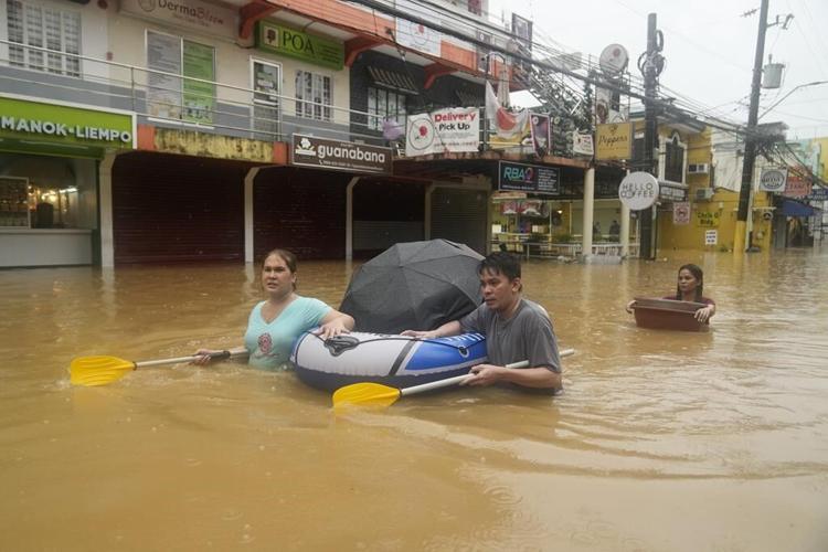 Storm sets off floods and landslides in Philippines, leaving at least 9 dead