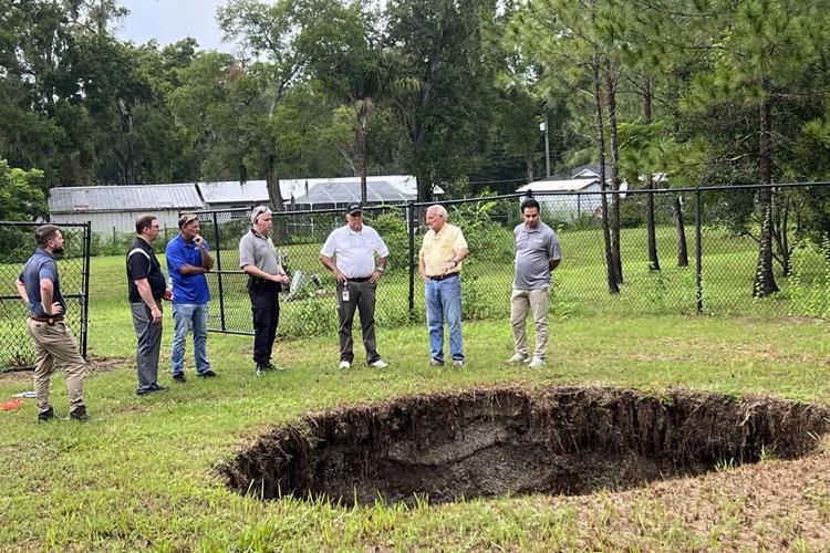 A Florida sinkhole that claimed a man's life in 2013 reopens, this time harmlessly