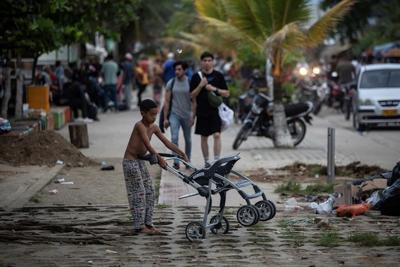 Migrants flounder in Colombian migration point without the money to go on