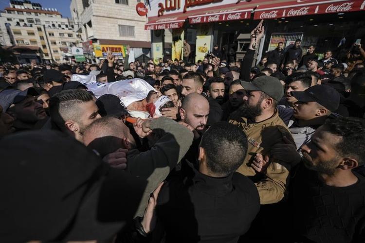 Israel says Palestinian militants fired rockets after raid
