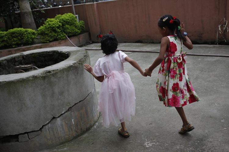 2 girls survived Nepal's 2015 earthquake. Each lost a leg, but found friendship in the hospital