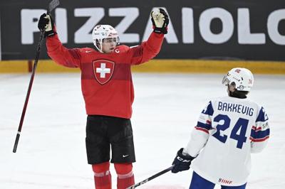 Switzerland tops Norway to reach quarterfinals at world juniors