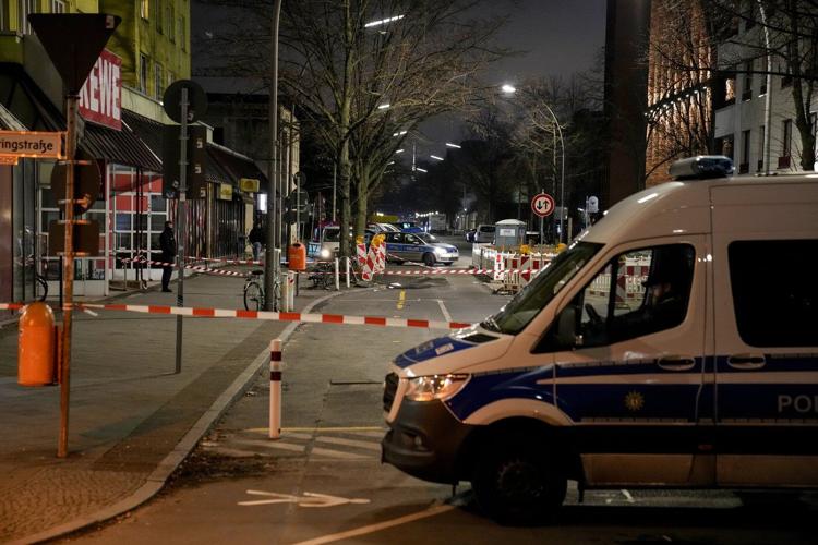 Berlin police say they have detained a man who attacked 2 people with a knife