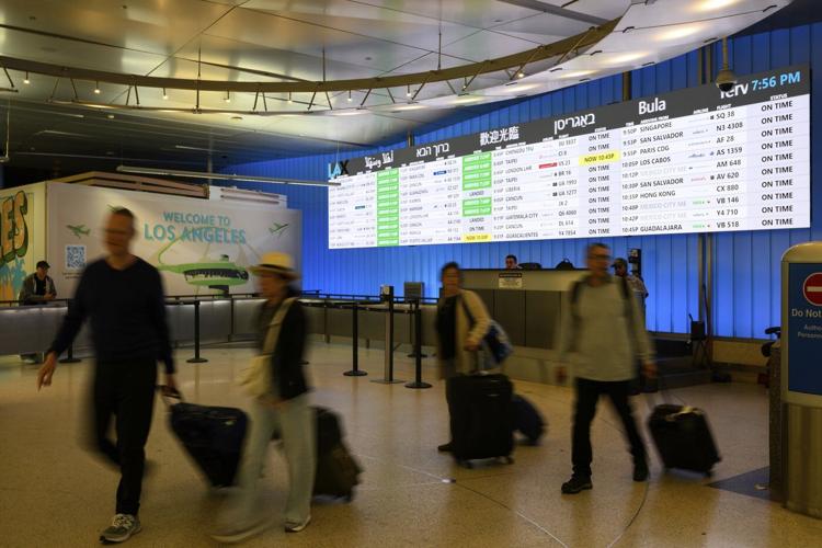 Trump's new travel ban takes effect as tensions escalate over immigration enforcement