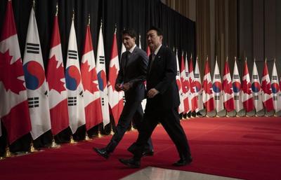 Trudeau heads to Asia for weeklong trip : In The News for May 16