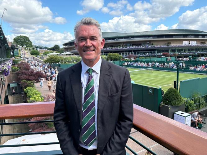 Wimbledon kept its courts lush green as other London lawns browned in record heat