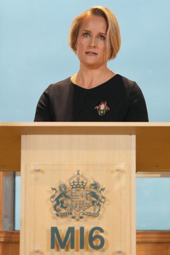 Britain’s MI6 spy chief says Putin is dragging out peace talks and wants to subjugate Ukraine