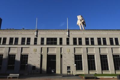 A New Zealand city waves goodbye to its 'disturbing' giant hand sculpture that many came to love