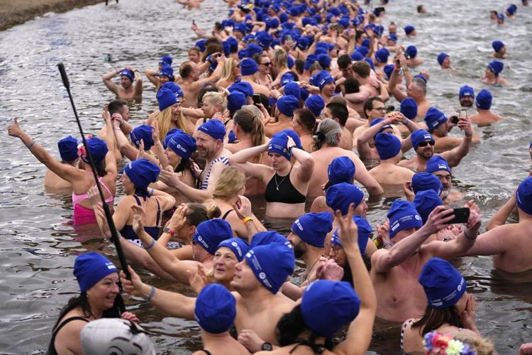 Cold-water swimmers in the Czech Republic set a new world record for the largest polar bear dip