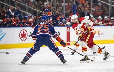 Flames re-sign defenceman Ilya Solovyov, centre Cole Schwindt